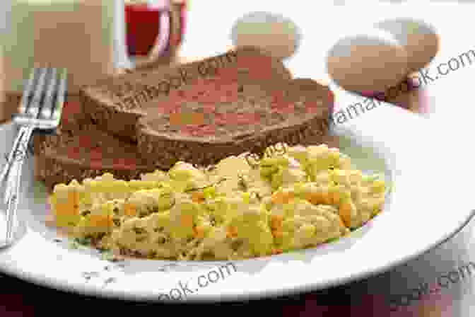 A Plate Of Scrambled Eggs With Whole Wheat Toast Healthy Quick Easy Smoothies: 100 No Fuss Recipes Under 300 Calories You Can Make With 5 Ingredients