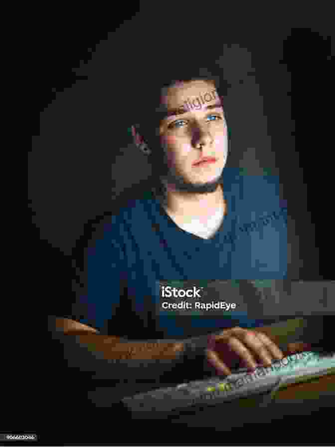 A Young Man Sits In A Dark Room, Staring At A Computer Screen. He Is Surrounded By Empty Pizza Boxes And Soda Cans. The Creator: Episode 1: The Useless (The Creator Series)