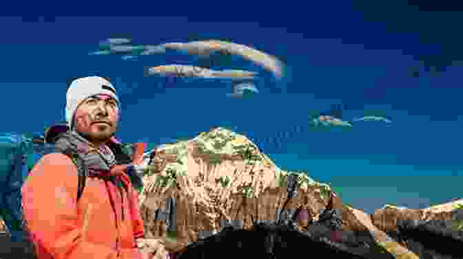 Portrait Of Khalid Khan, A Pakistani Mountaineer Wearing Climbing Gear And Smiling Maricle Storm Khalid Khan