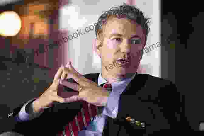 Rand Paul, A Republican Senator Known For His Threadbare Suits And Libertarian Views, Speaks At A Rally. Threadbare Rand Paul